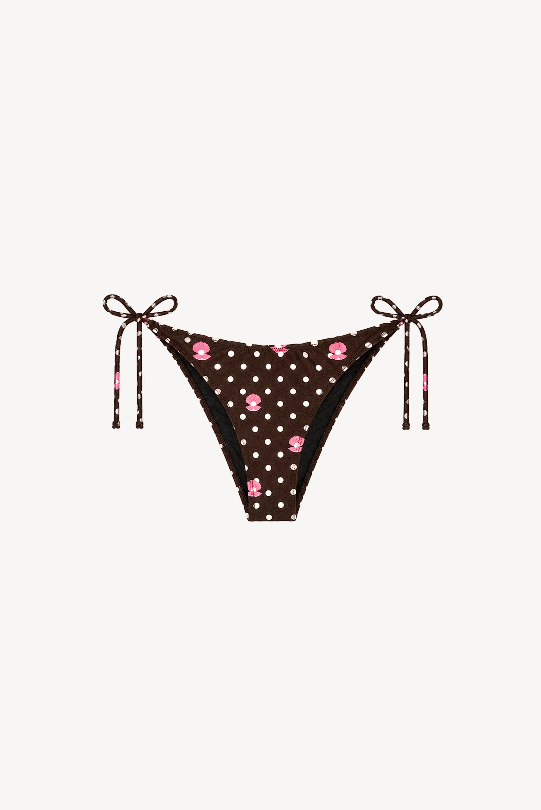 Clarissa polka dot tie-side bikini bottom packshot, dark brown base with white polka dots and hand-drawn pink shells and pearls